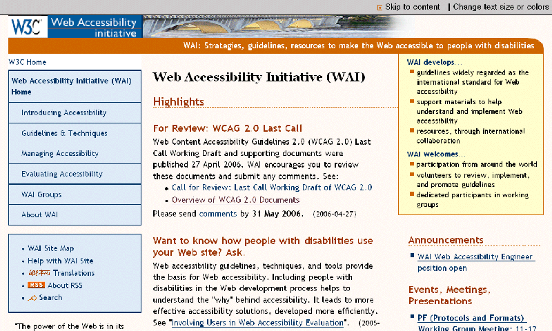 W3C WAIのサイト（www.w3.org/WAI/）の画面キャプチャ。主背景色は薄いオレンジ色で、ほとんどの文字は黒色である。左側に、明るい青色の背景色、濃い青色の境界色、濃い青色の文字色をした箱形の領域がある。